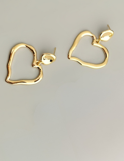 Unstoppable Beat: Luxurious Asymmetrical Heart-Shaped Sterling Silver Earrings