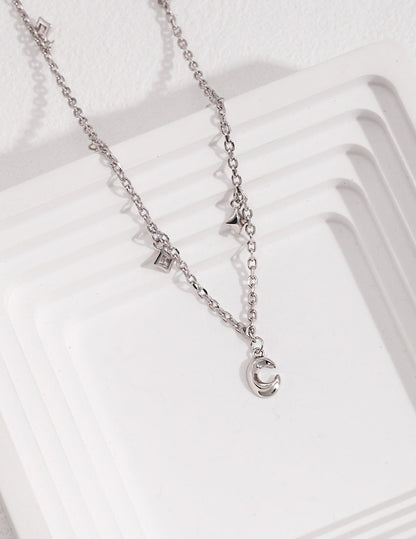 Chic Sterling Silver Necklace with Star and Moon Accents