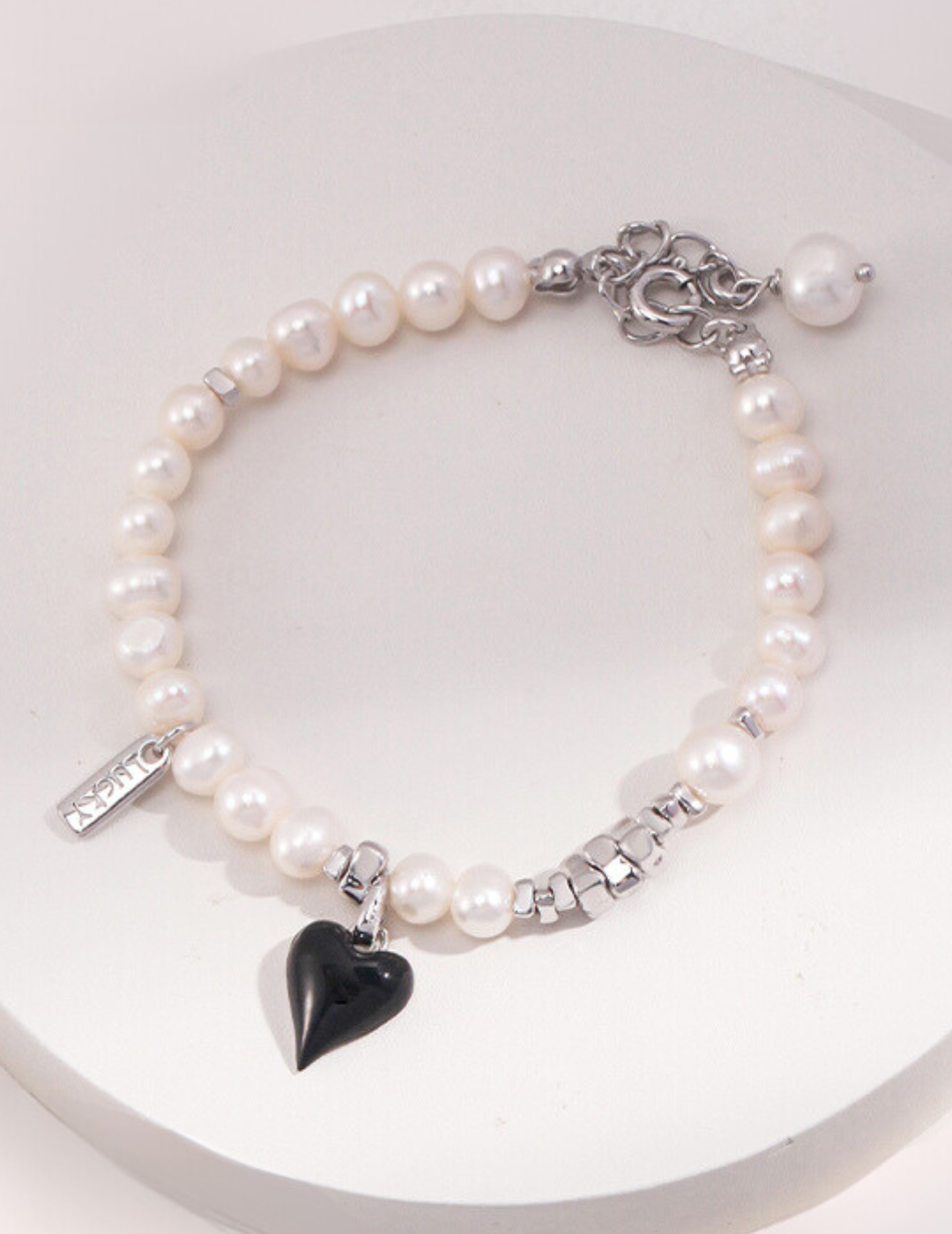 Heart of Darkness: Elegant Pearl Silver Bracelet