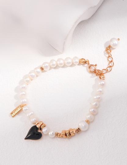 Heart of Darkness: Elegant Pearl Silver Bracelet