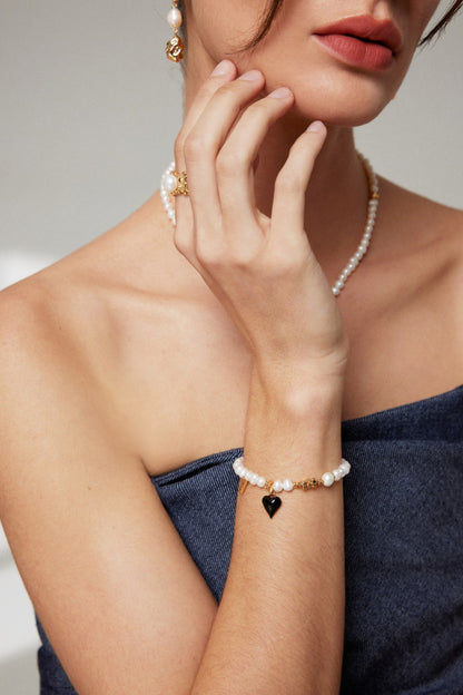 Heart of Darkness: Elegant Pearl Silver Bracelet