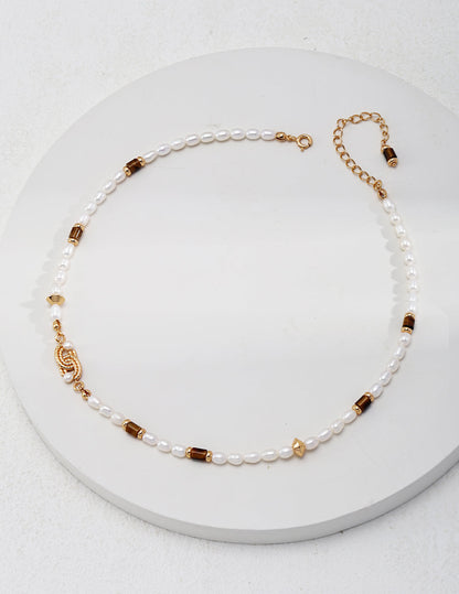 Elegant Opulence: Knotted Pearl and Tiger Eye Stone Necklace in Sterling Silver