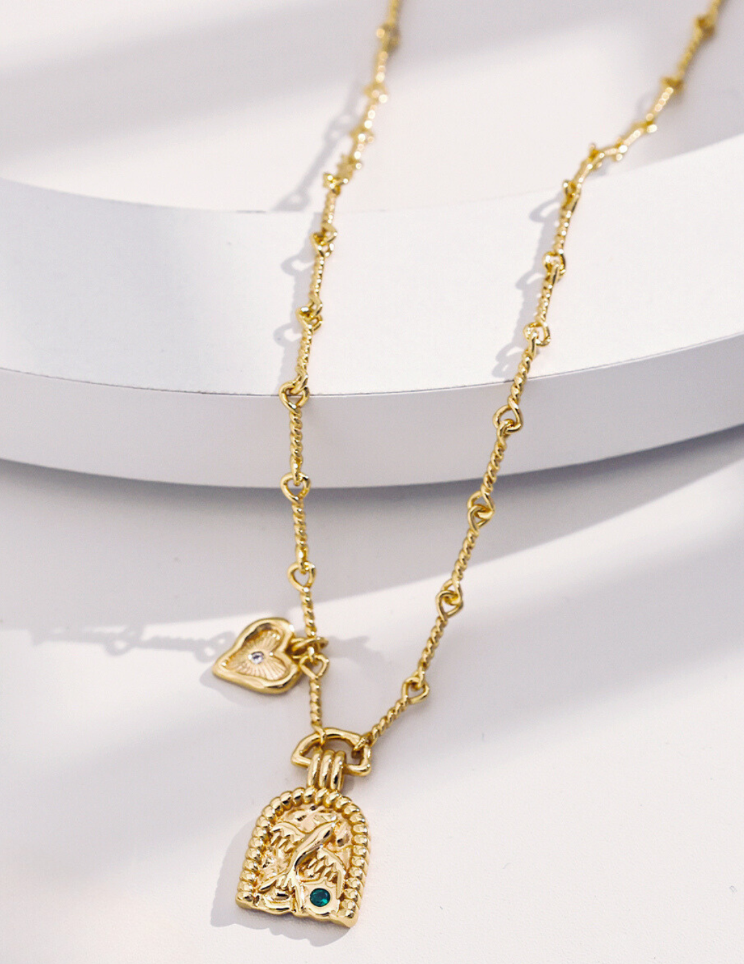 Eternal Love and Freedom: Retro Gold Heart and Swift Pendant Necklace