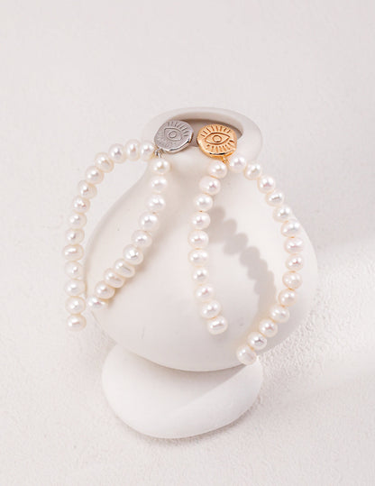 Timeless Elegance: Queen Pearl Drop Earrings