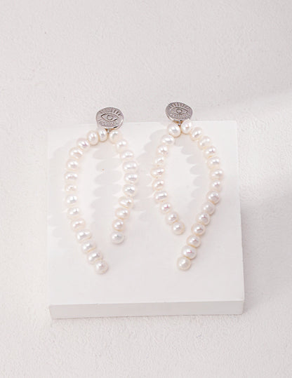 Timeless Elegance: Queen Pearl Drop Earrings